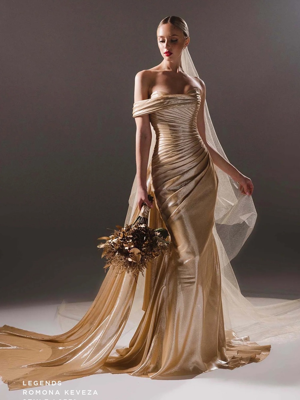 Romona Keveza Metallic Gold Strapless Draped Gown